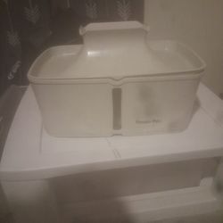 animal drinking waterfall