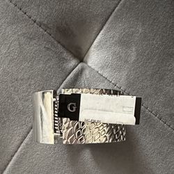 Brand: Guess Women's Silver Textured Cuff Bracelet