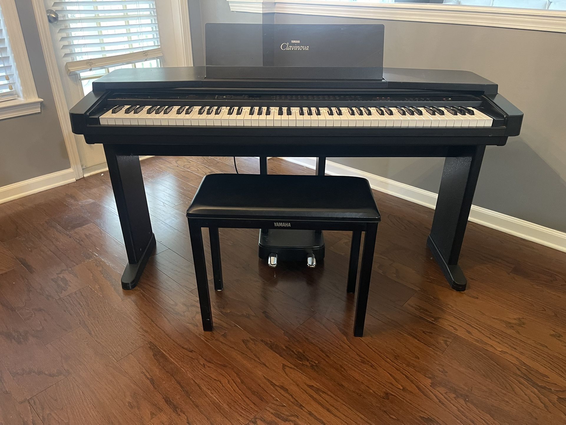 Yamaha Clavinova CVP-30 full-size digital piano with Yamaha bench.