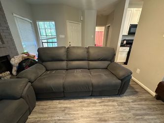 Matching Gray Reclining Sofa & Loveseat Set – $650