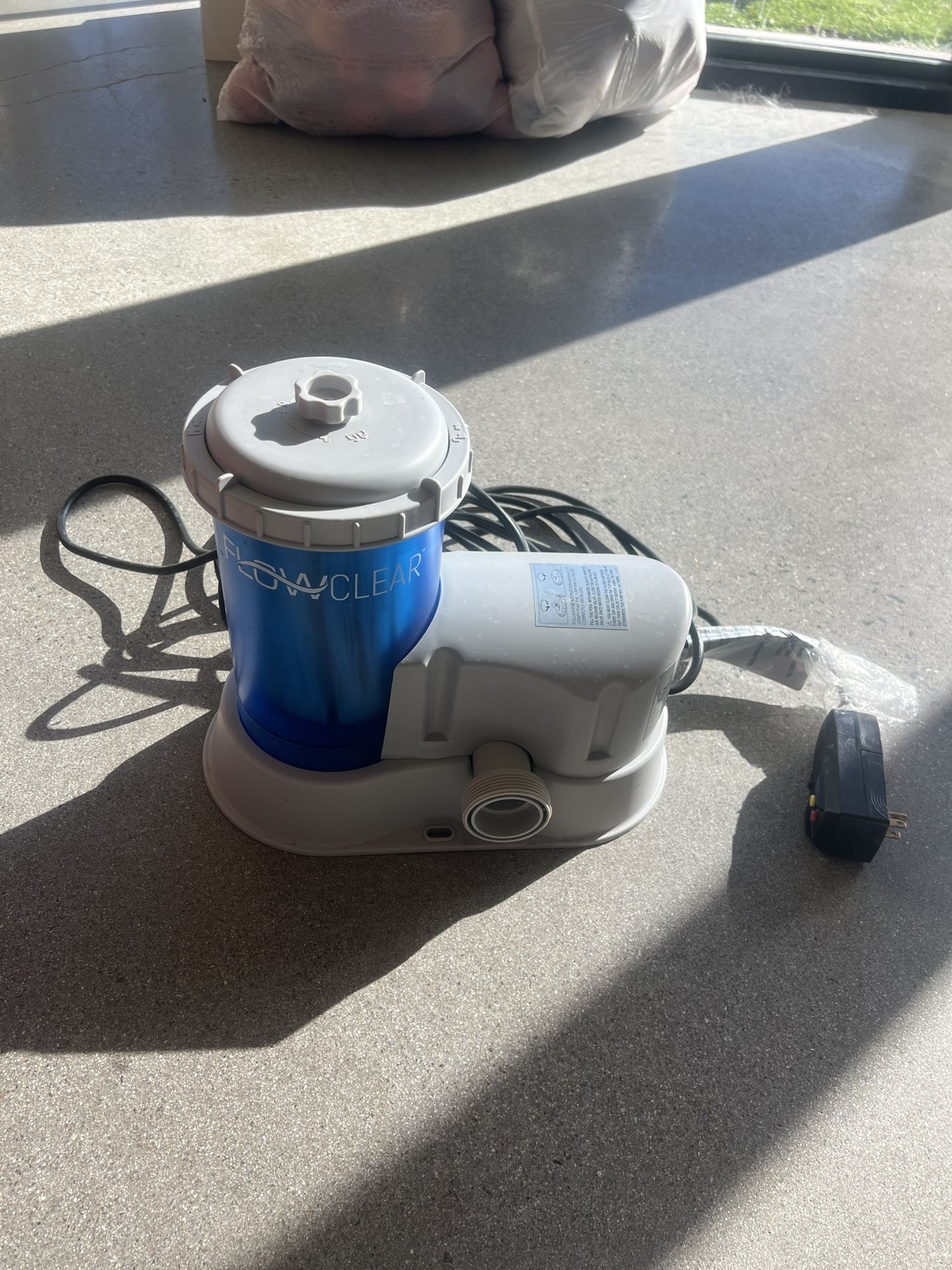 New // Coleman filter pump, model #90473E, for above-ground pools.