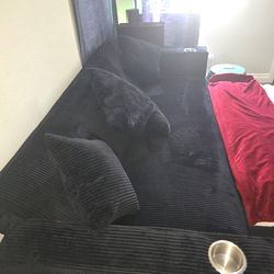 Black fold down couch