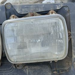 Nissan Hardbody OEM Headlight Mounts 