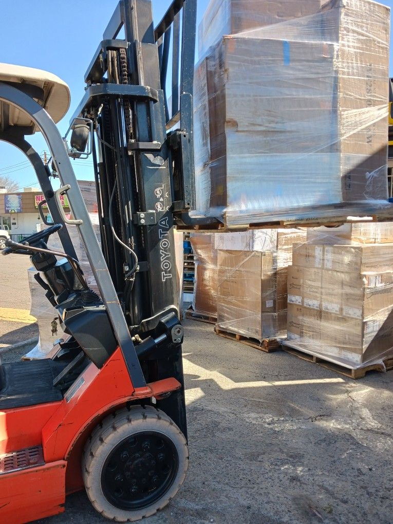 Forklift Service Unloading And Loading Moving Material