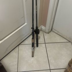 3 Fishing Poles And 1 Reel Bait Caster