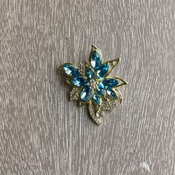 Sophisticated Golden Flower Brooch Adorned W/ Light Blue Stones & White Rhinestones