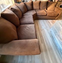 Brown suede sectional sofa
