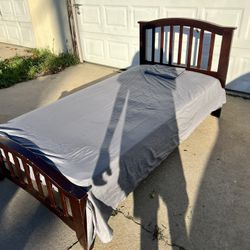 Twin Brown Bed With Mattress And 2 Set Of Sheets 