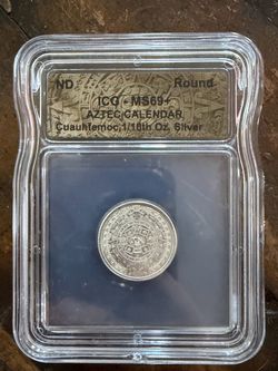 Aztec Calendar 1/10 oz silver round minted by the Golden State Mint, encapsulated and graded MS69+ by ICG