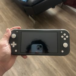 Switch lite W/ Charger 