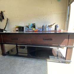 Black And Brown Tv Stand With Glass Too And Bottom Shelf 