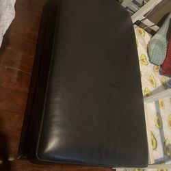Ashley’s Leather Ottoman 