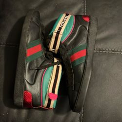 Gucci Black Leather High-top Sneakers. 