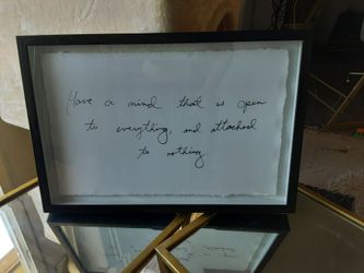"Have a mind that is open to everything & attached to nothing." Framed wall art.