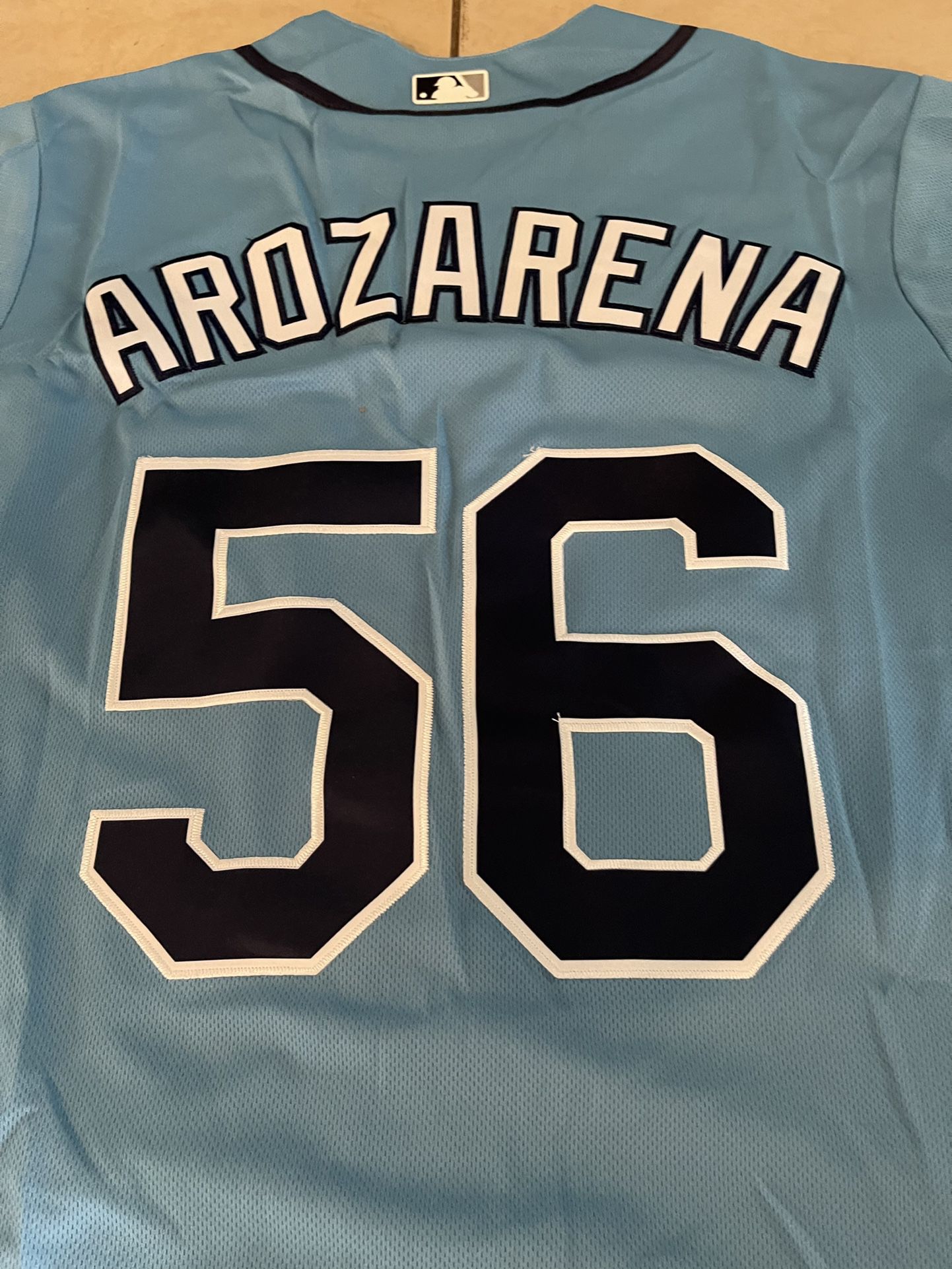 Game Used 25th Anniversary Navy Jersey: Randy Arozarena - 4 HR, 15 RBI, 9  H, 6 R - 6 Games - Size 44 S1