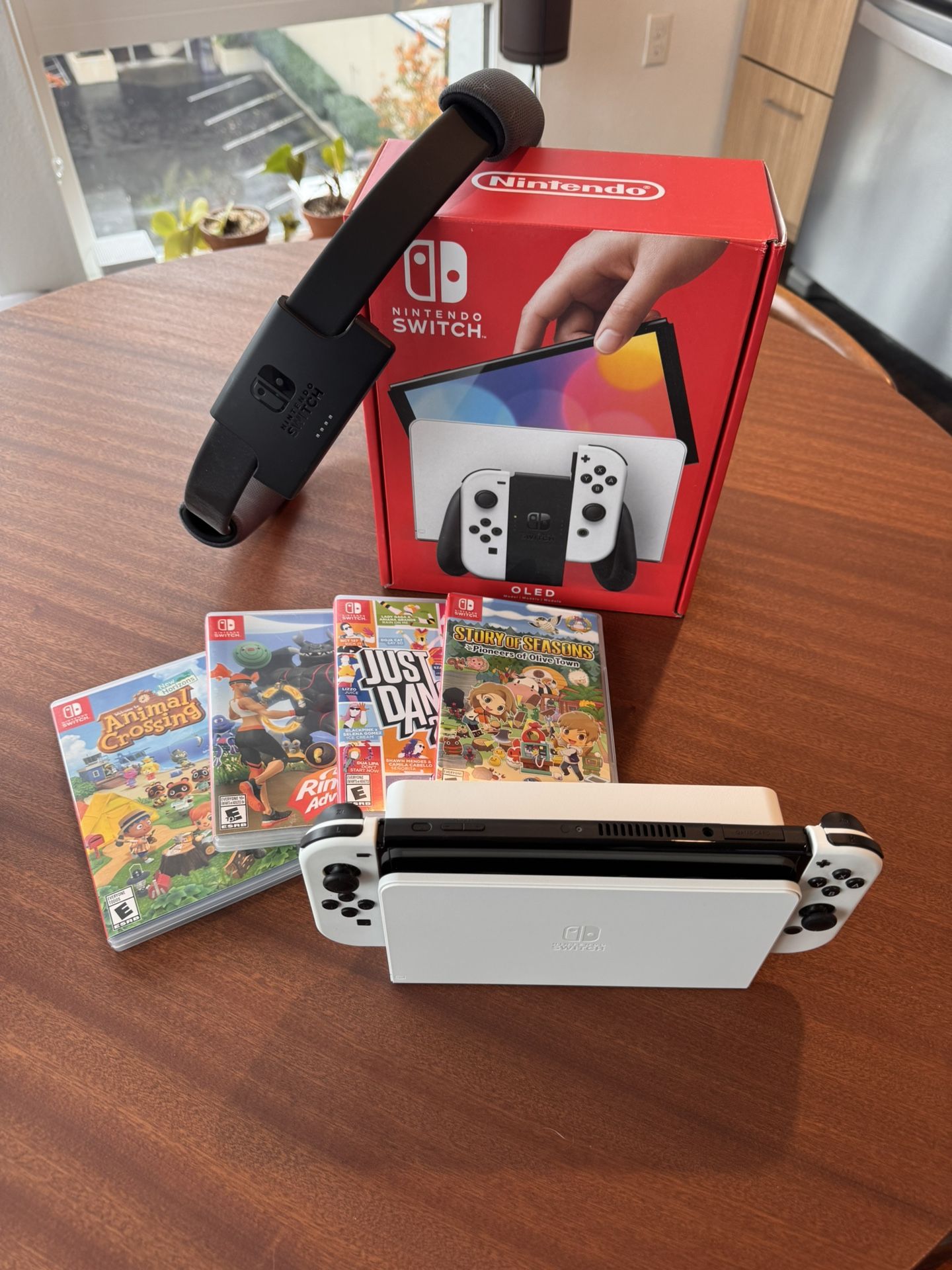 Nintendo Switch OLED + Games + Ring Con