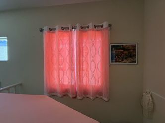 2 white and 2 pink curtains
