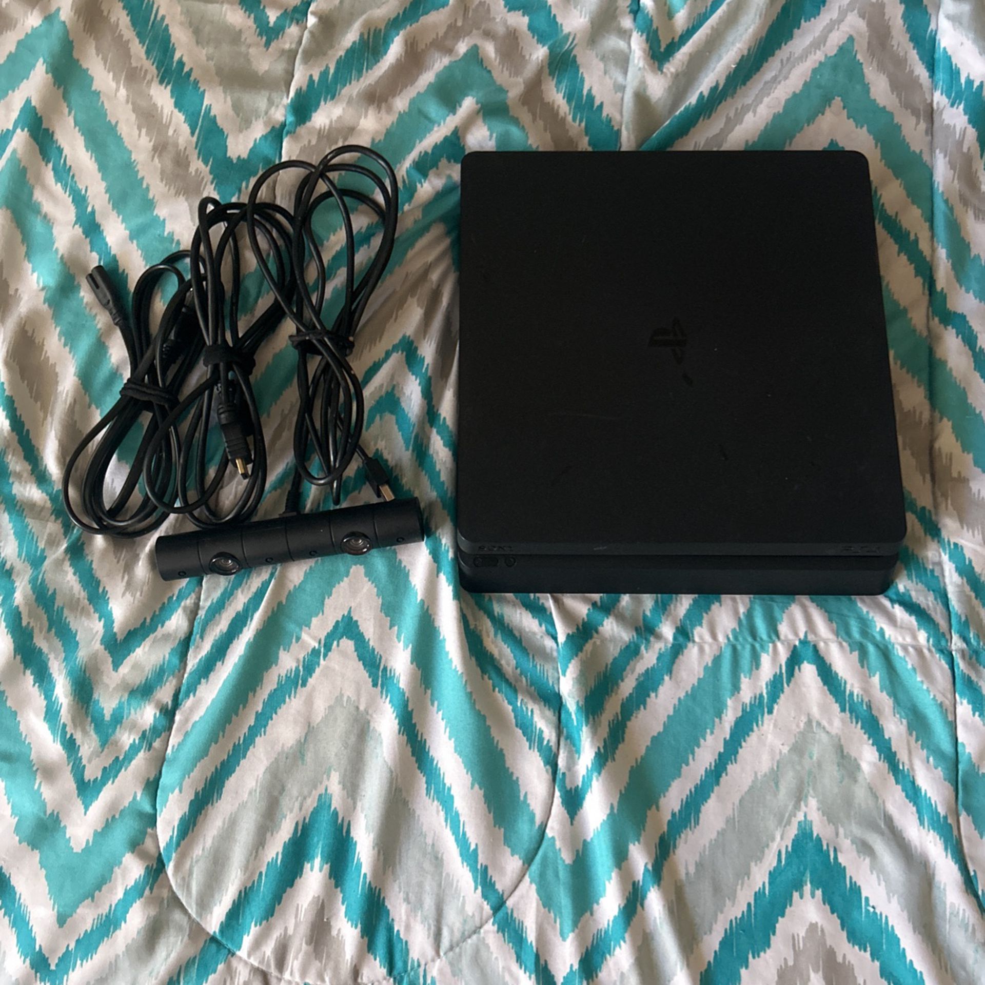 PS4 Slim 500 GB,includes PS4 Camera And Control 