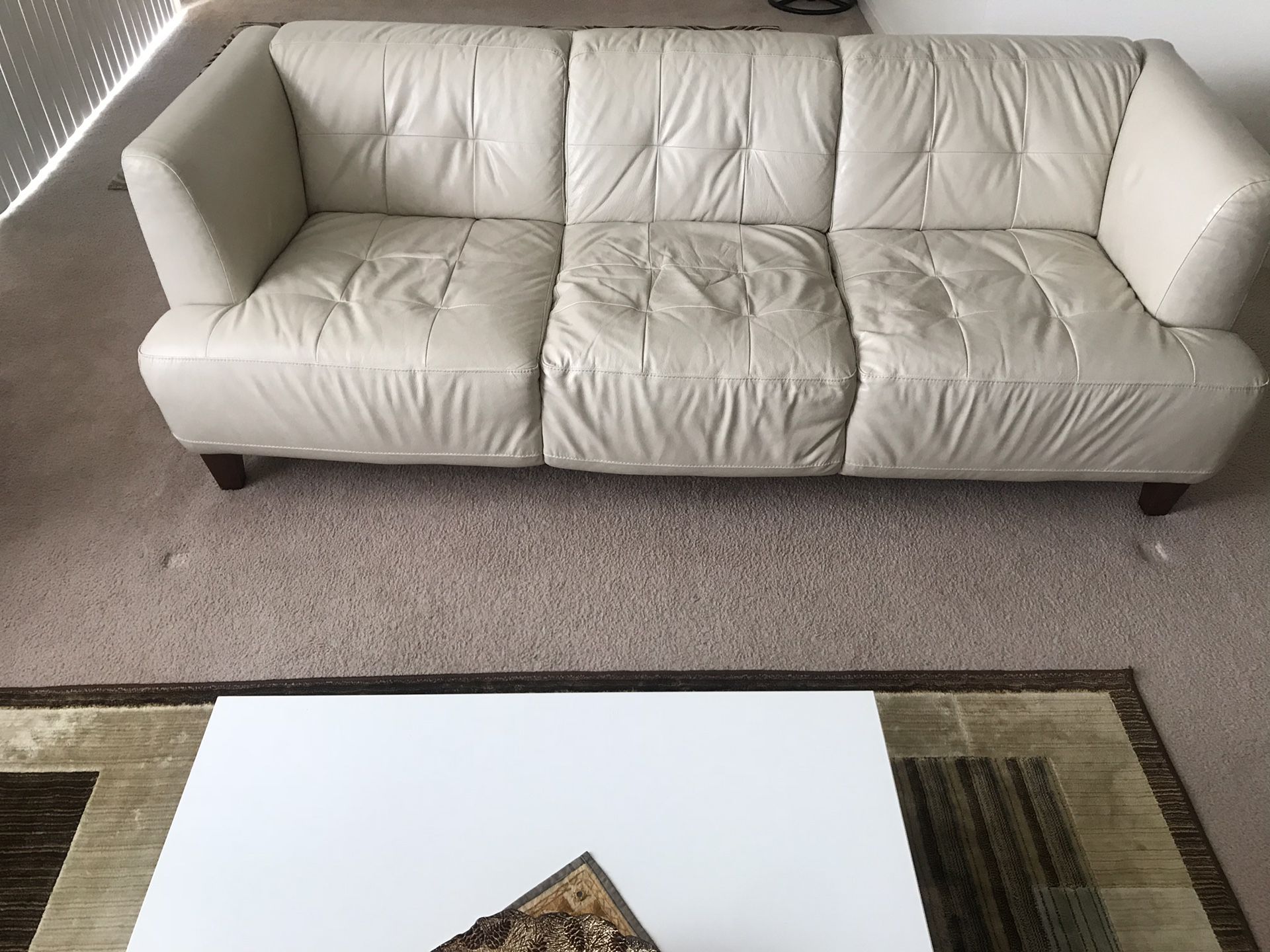 Cream leather sofa and arm chair