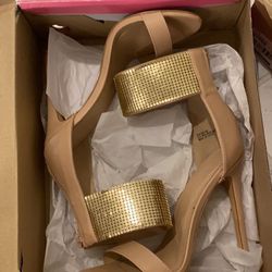 Nude heels with a cute gold ankle trim