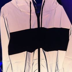 Reflective waterproof jacket size medium fits like large