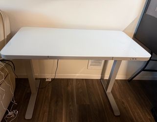 Power adjustable desk