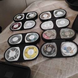 SONY PLAYSTATION W/GAMES AND MOVIES AND CHARGER  ASKING $130.00