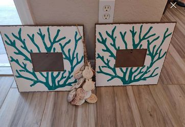 Nautical picture frames and seashell decoration