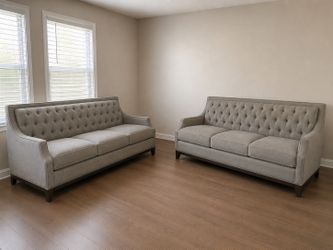 Gray tufted three seat sofa couch