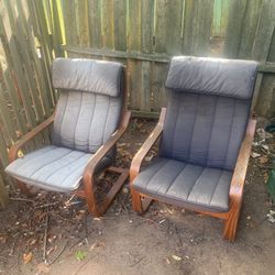 FREE! Set of  2 IKEA POÄNG Chairs  They are faded and appear to have been used outside.  Pick up available in Arlington VA by the Sheraton off of Colu