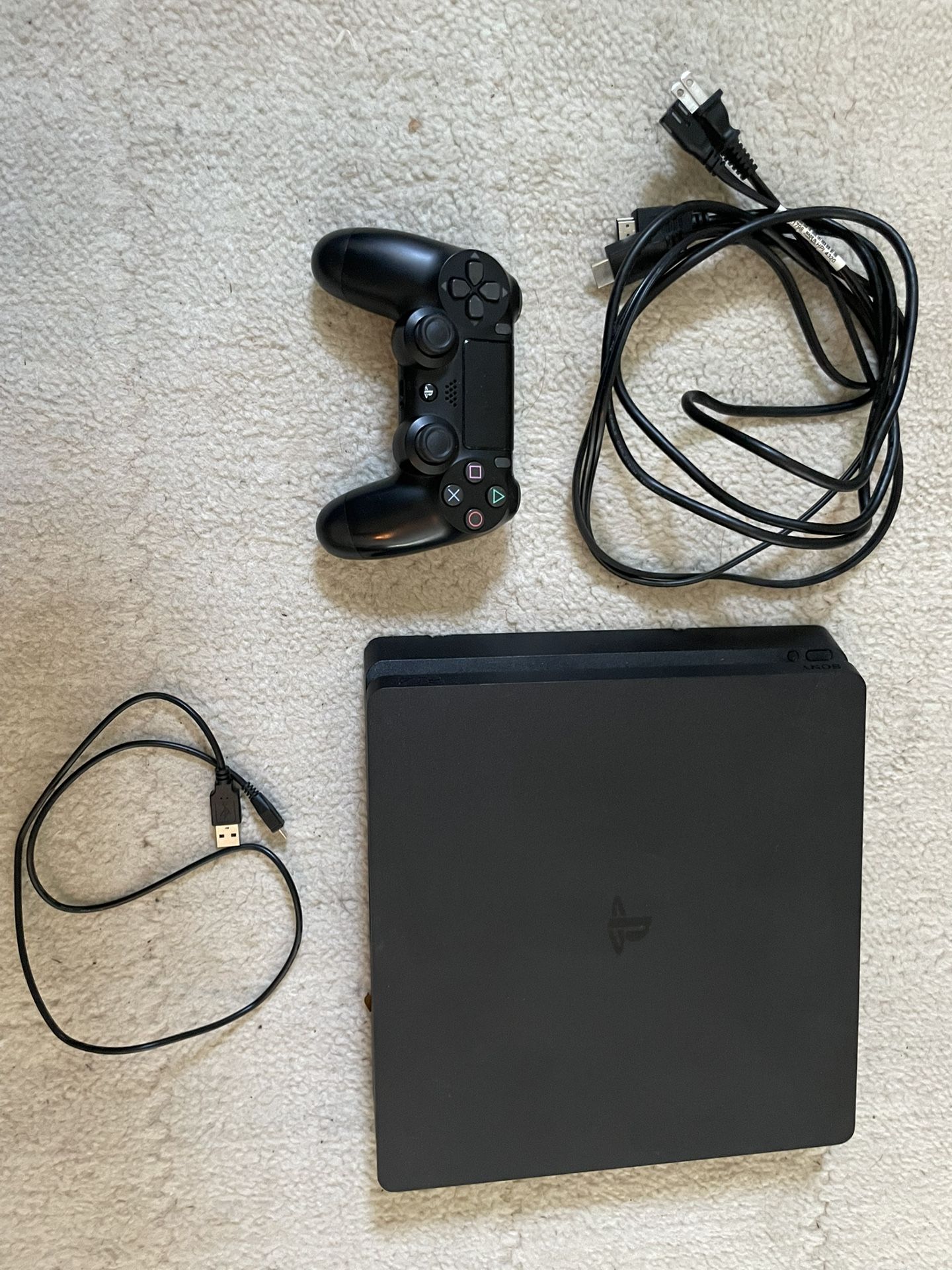 PS4 Slim 1TB + Controller + Cables – Great Condition!