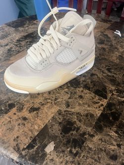 Woman’s Off White 4s