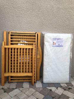 folds into baby cradle or small bed, with mattress, missing 1 screw