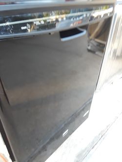 Black Maytag dishwasher with stainless steel inside