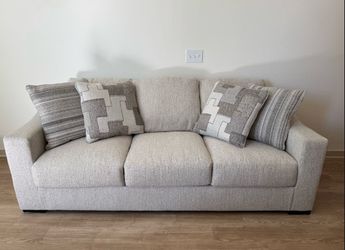 Sofa + ottoman from Ashley Fur.
