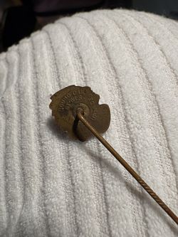 Antique pins and decorative pieces