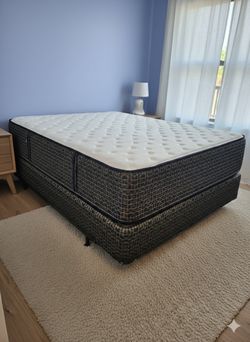 New queen mattress and box spring 2 pc bed frame is not included