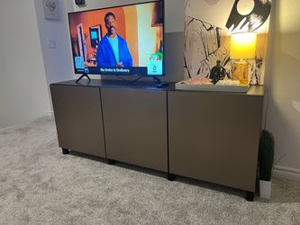 IKEA Besta tv stand with gold doors