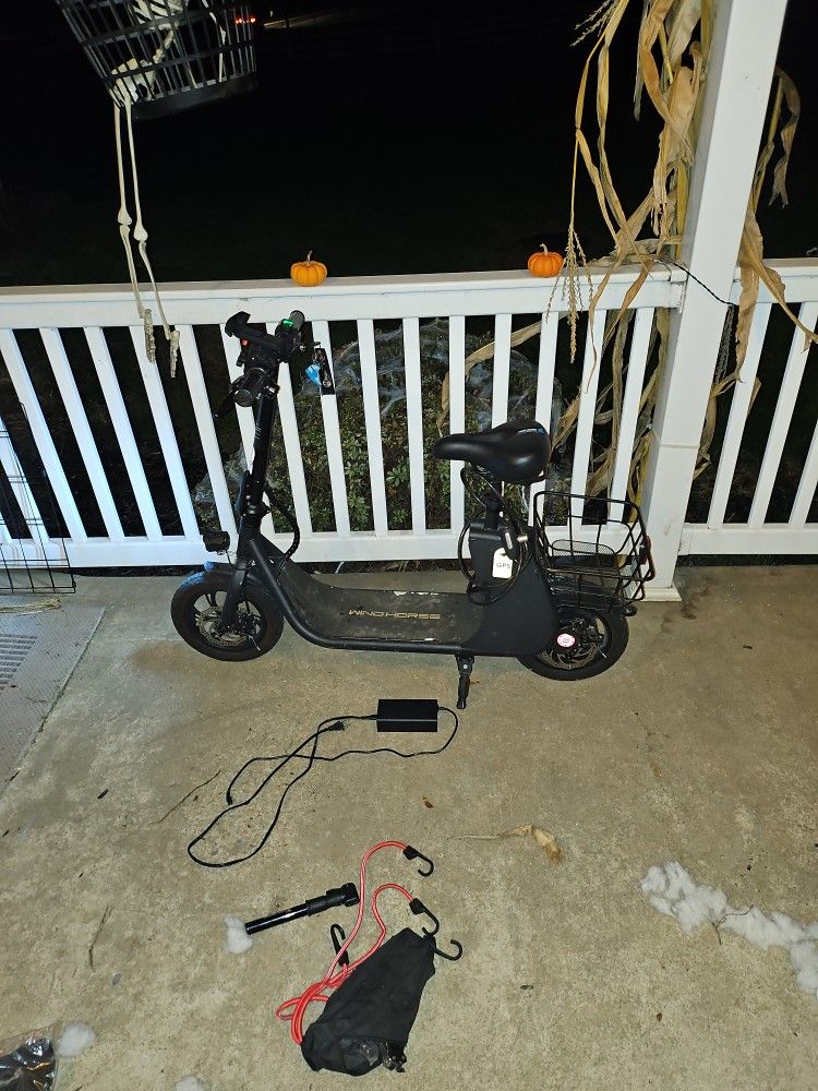 Barely used electric scooter runs great.