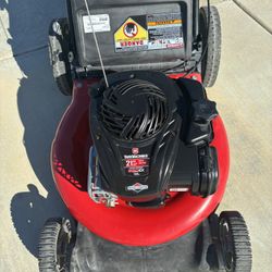 Very nice Yard Machine push lawnmower. Like new. Starts right up and runs perfect.