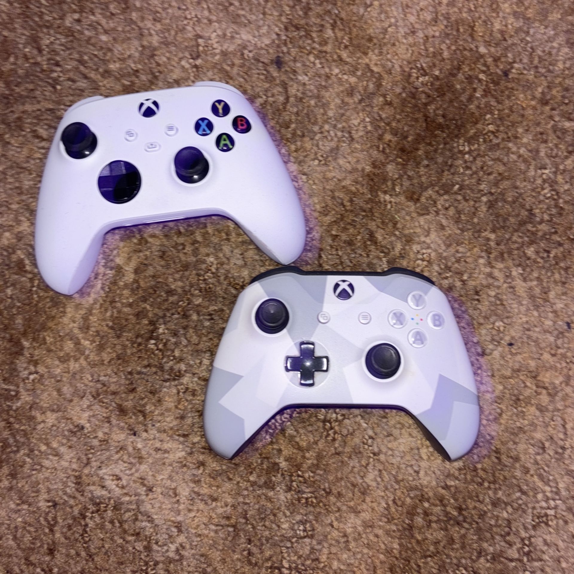 Two Xbox Controllers