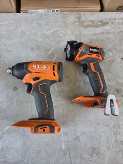 Ridgid 18v impact drill driver and flashlight. Tool Only!!