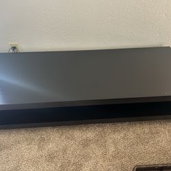 Low-profile tv stand with open shelf