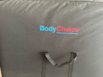 Massage table