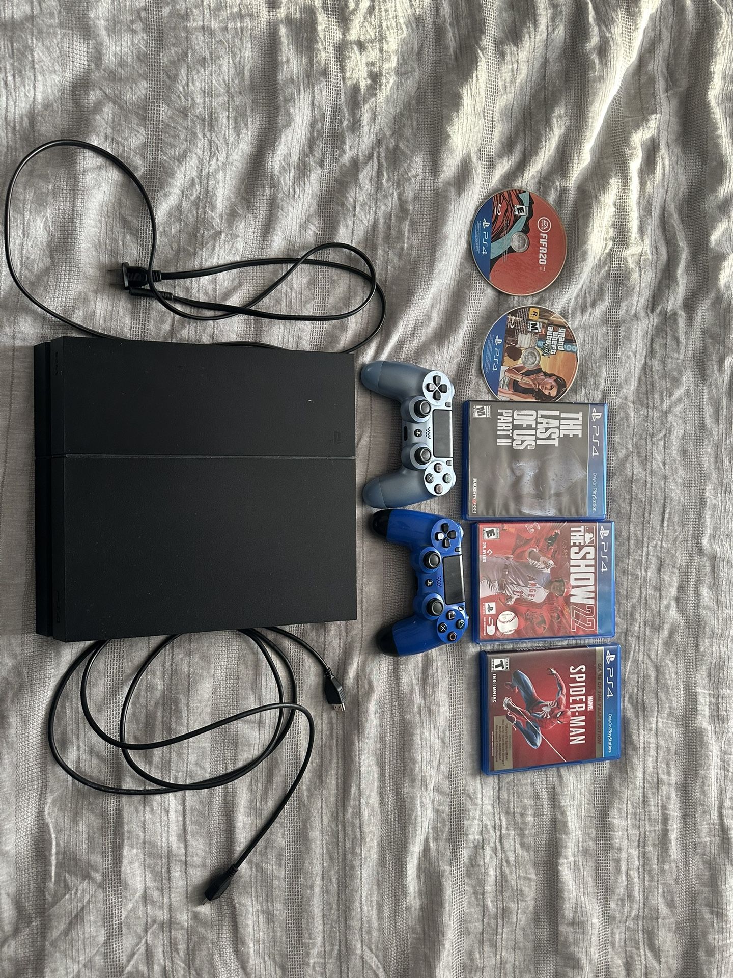 PS4 With Games And Controllers