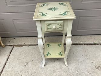 Painted occasional table has a drawer & shelf sturdy solid must see for the price  Top is  16 diameter & it’s 32 tall low profile