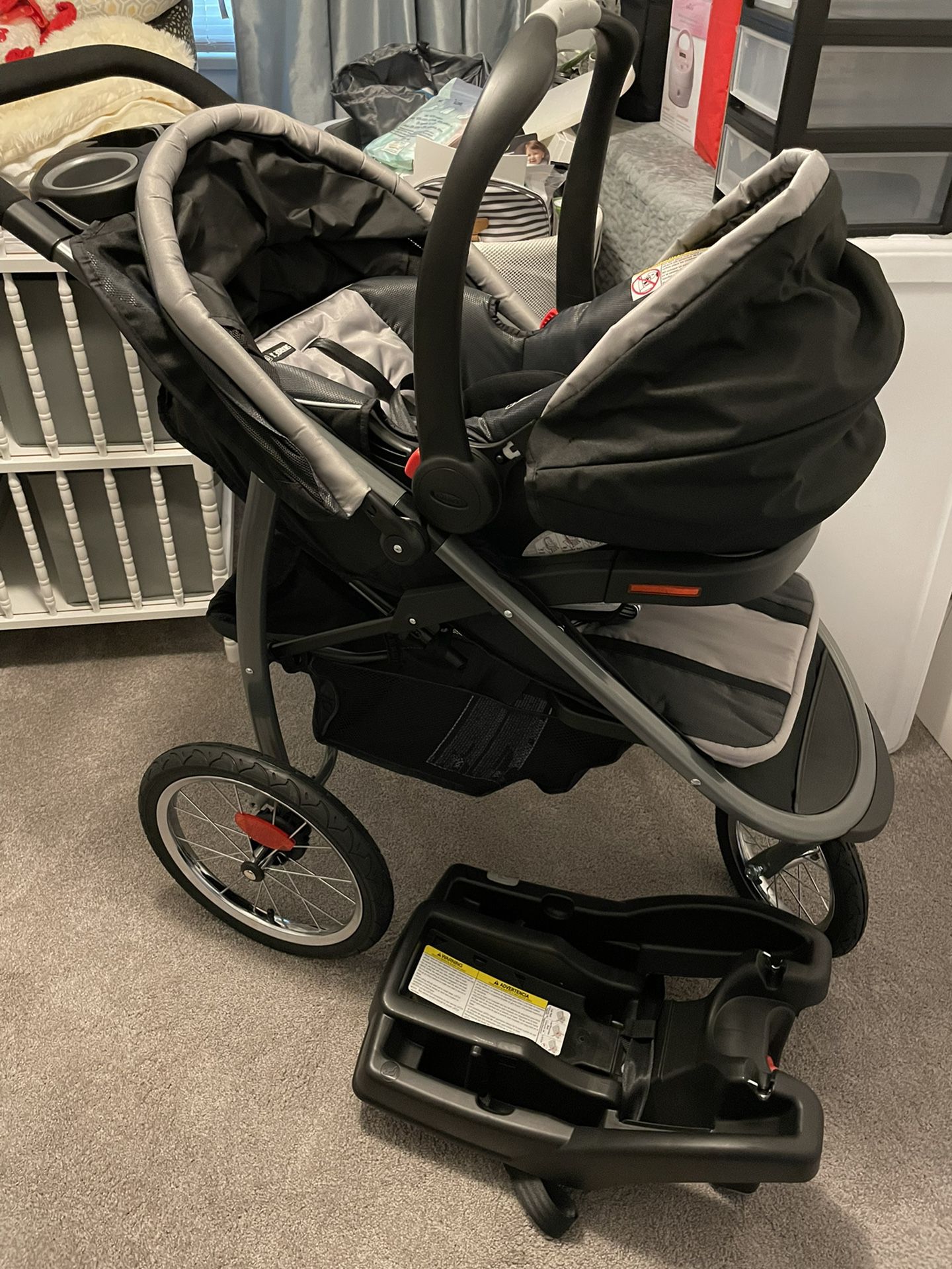 Graco Fast Action Jogging Stroller And Carseat 
