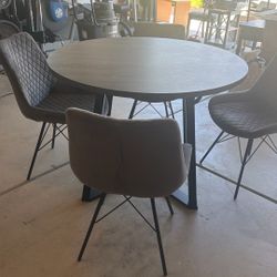 Round Table And Four Chairs