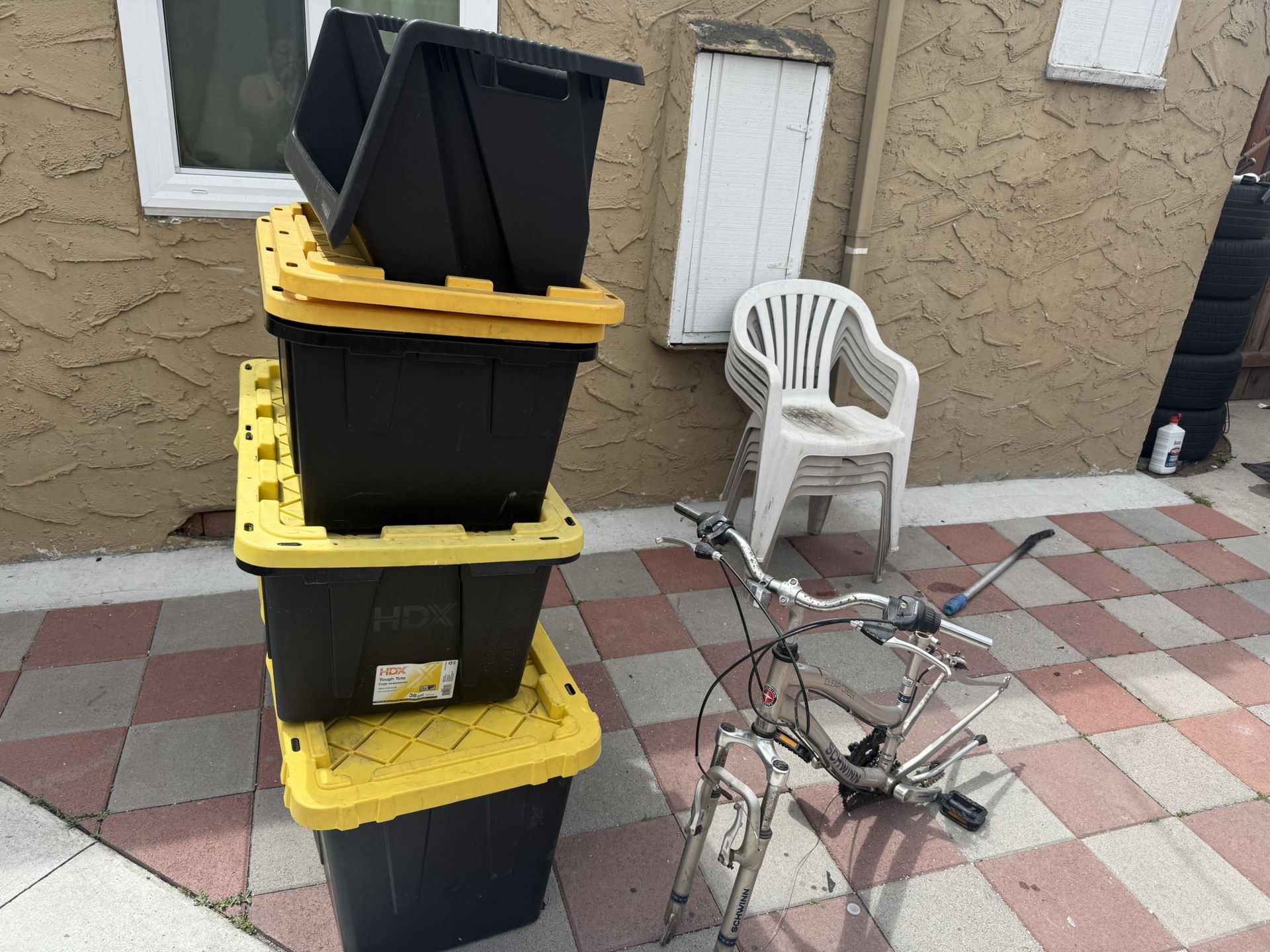Storage Boxes And Chairs And Bike Frame