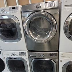 LG Front Loading Washer And Samsung Stackable Gas Dryer Set With Steam In Stainless Steel 